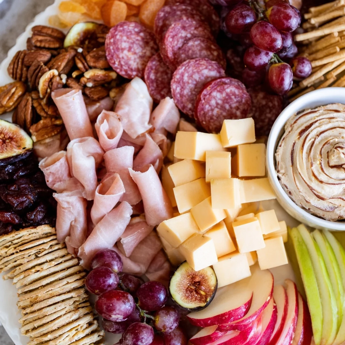 Festive charcuterie board with gingerbread dip, perfect for holiday entertaining and sharing.  