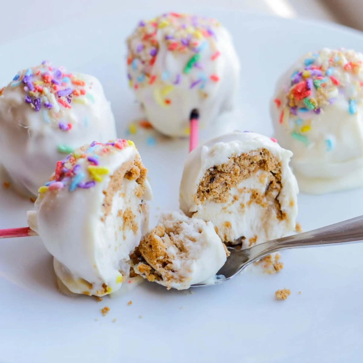 Whimsical Cream Soda Spiced Biscuit Pops, golden and creamy, perfect for parties.  