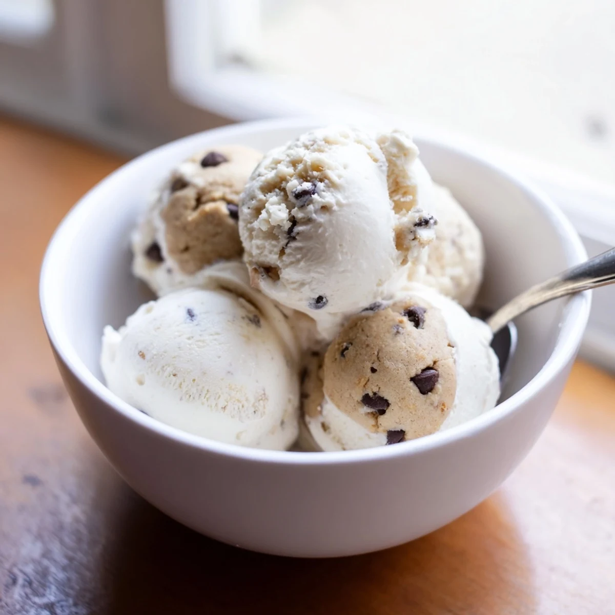 Delicious homemade cottage cheese ice cream swirled with sweet cookie dough bites.  