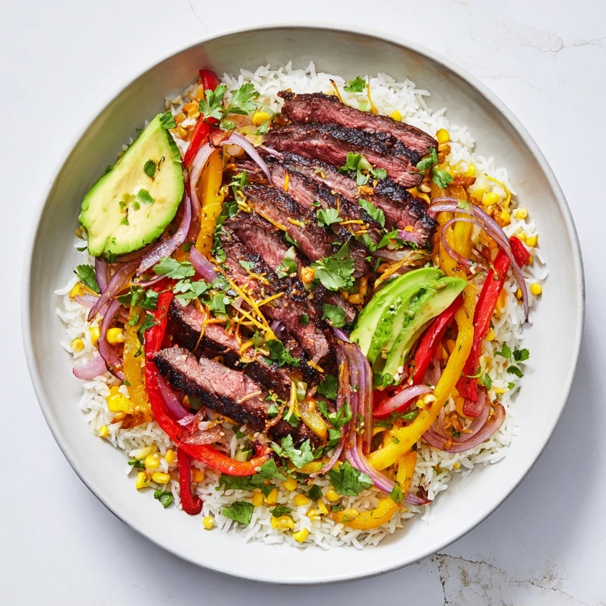 A visually appealing BBQ Steak Fajita Bowl overflowing with juicy steak, fresh toppings, and zesty flavors, waiting.