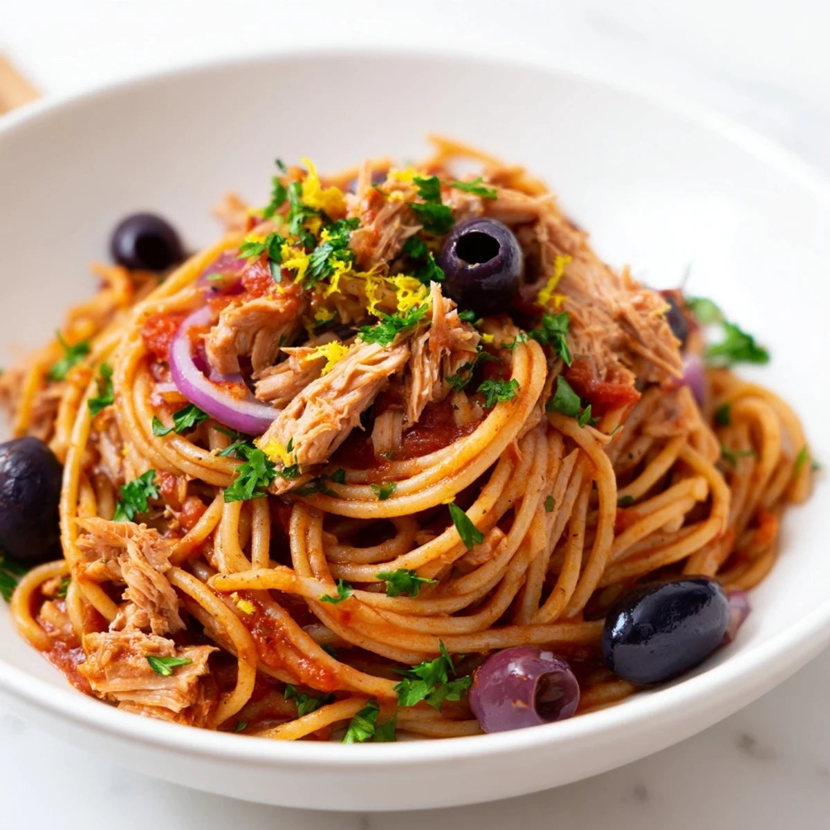 Pasta with Tuna, Olives & Capers: A close-up view of the flavorful pasta dish ready to serve.