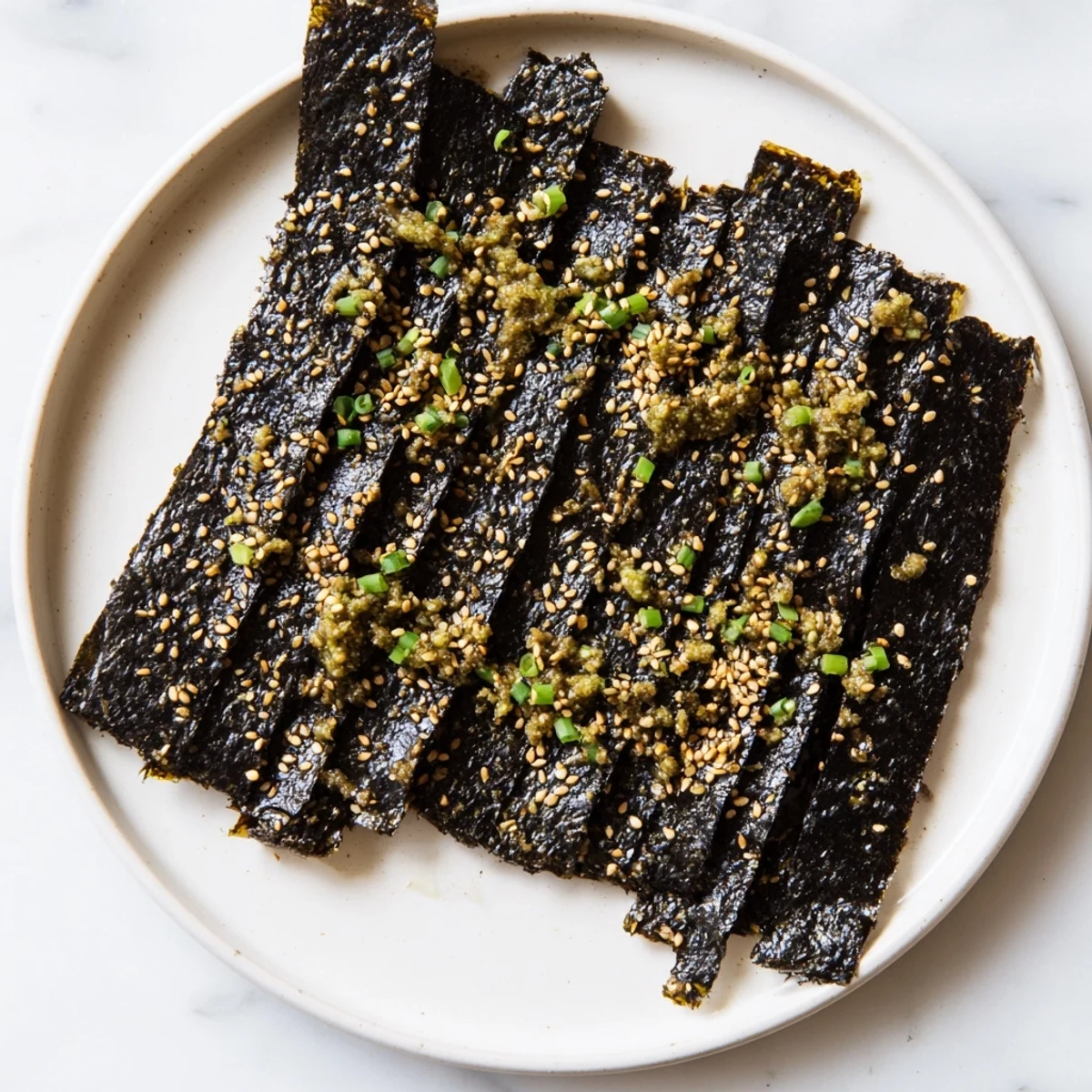 Golden, toasted Snacks de Vague Surf seaweed strips, seasoned perfectly and ready for serving.