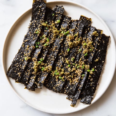 Golden, toasted Snacks de Vague Surf seaweed strips, seasoned perfectly and ready for serving.
