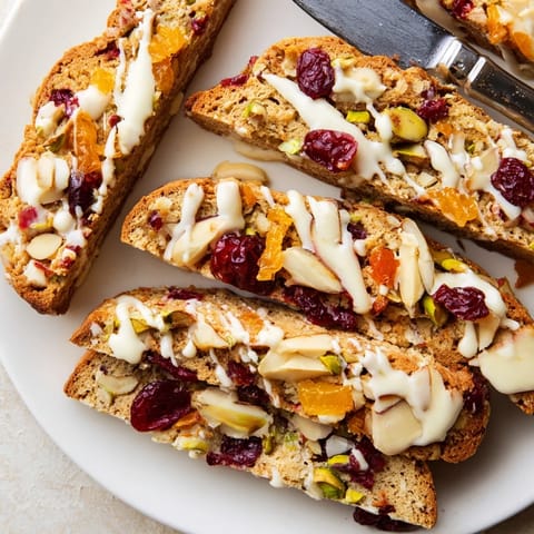 Deliciously spiced Festive Christmas Biscotti paired with coffee for holiday joy.  