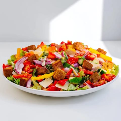 Freshly made La Scala Chopped Chickpea Salad with vibrant vegetables, ready to serve and enjoy.