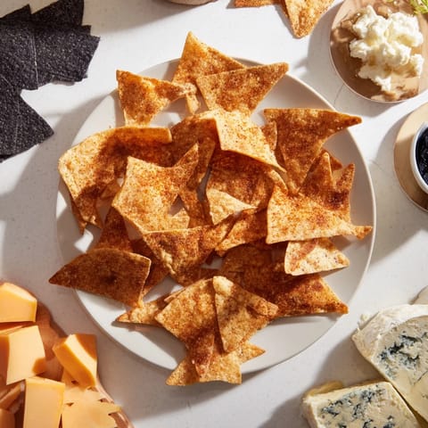 The dark and delicious Spooky Night Bat Halloween Board presents an array of savory and sweet goodies.